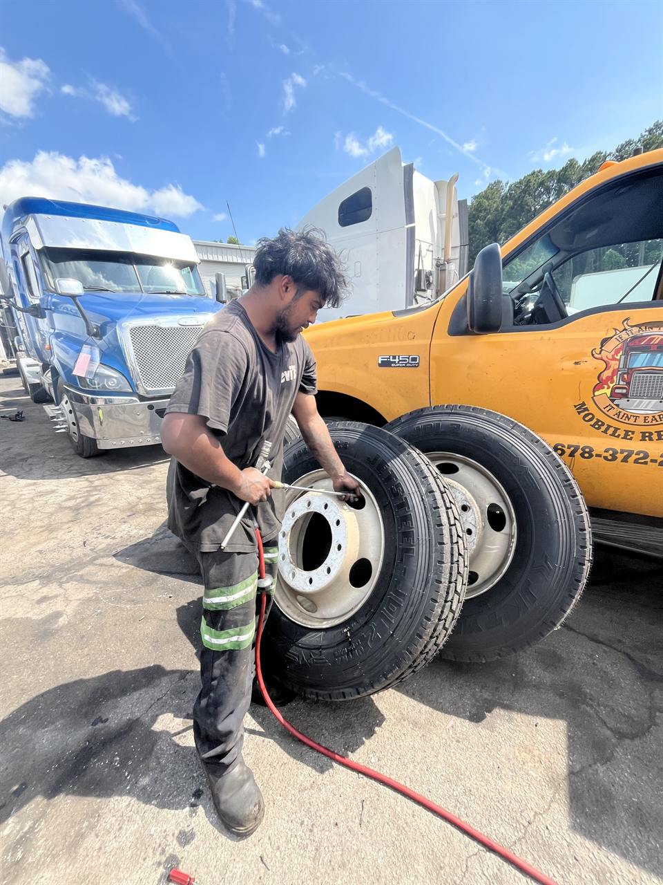 Mobile Rescue service truck handling roadside tire and wheel work